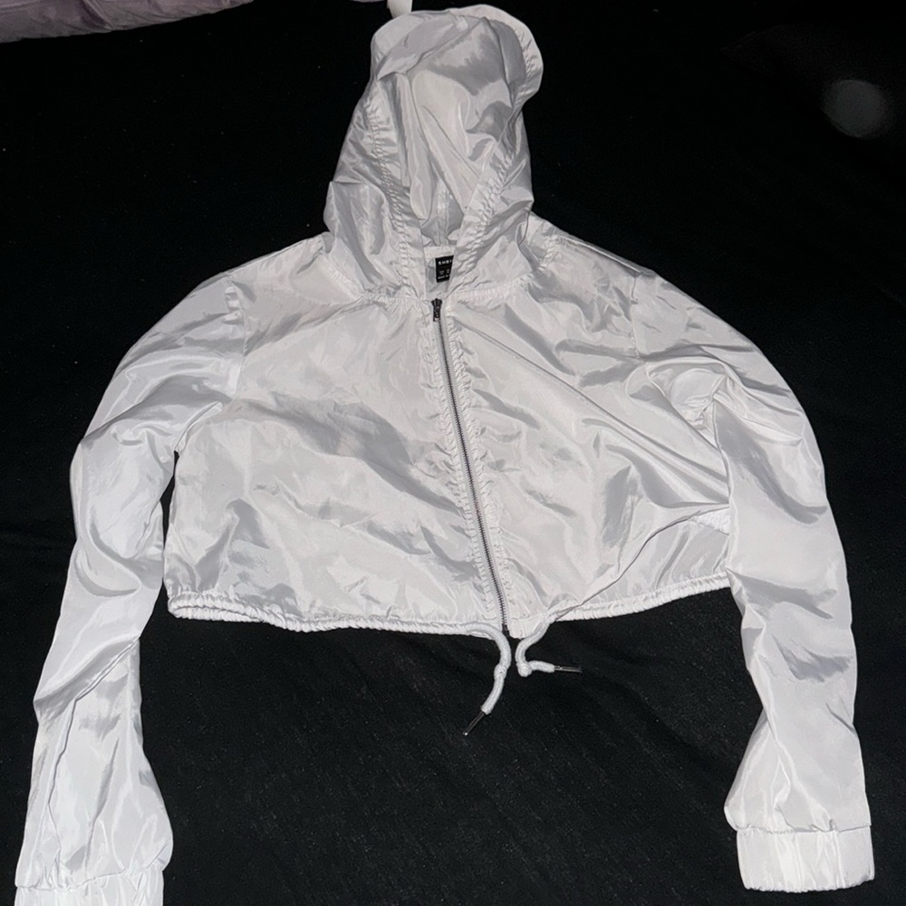 white zip up jacket